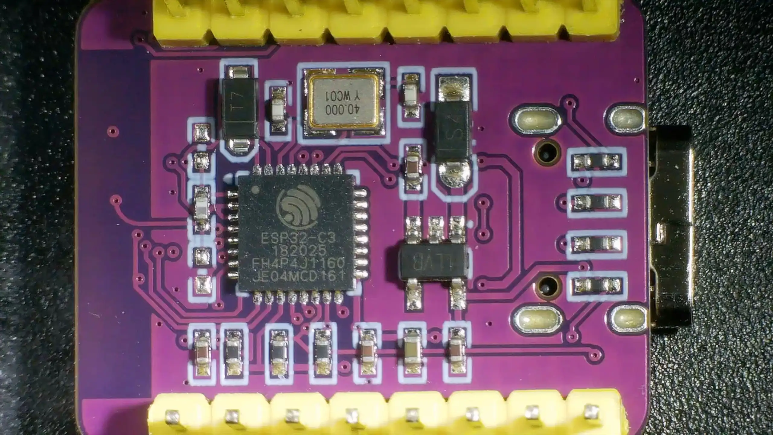 ESP32-C3 board under the microscope